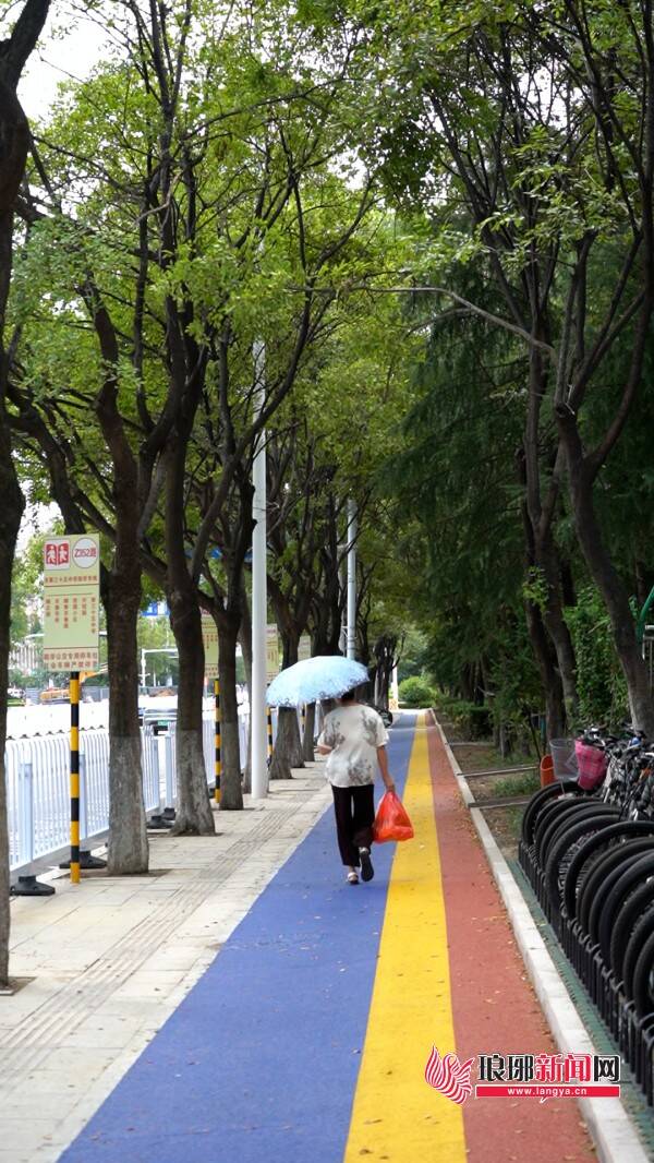 麻将胡了|临沂：“彩虹护学路”别样风景线